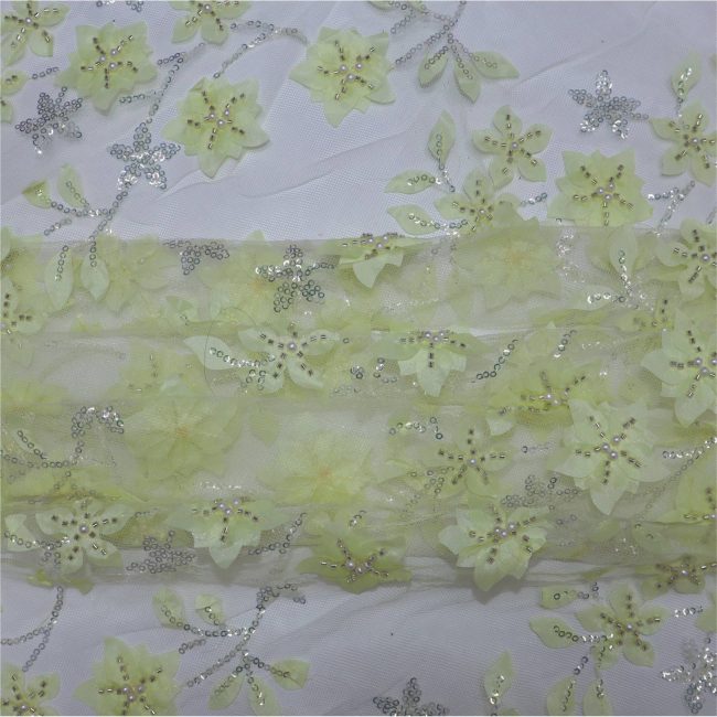 Elegant Floral Embroidered Fabric with Sparkling Accents - Image 12