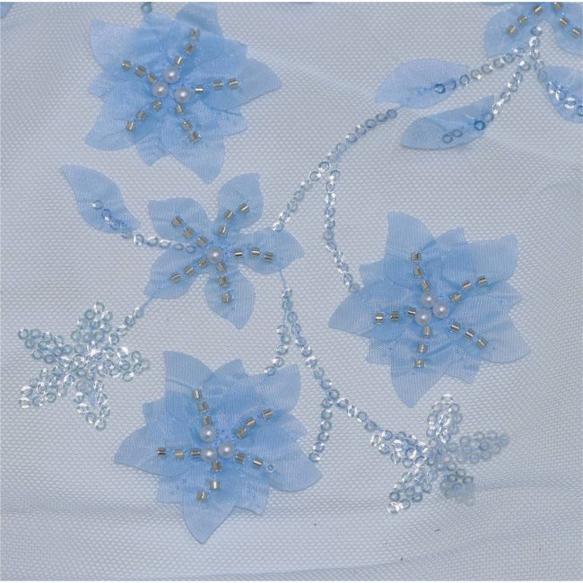 Elegant Floral Embroidered Fabric with Sparkling Accents - Image 4